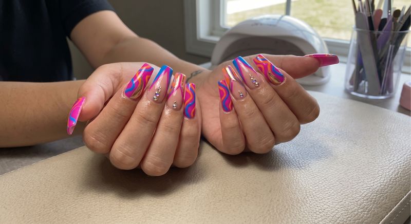 Hand-painted bold geometric nail art